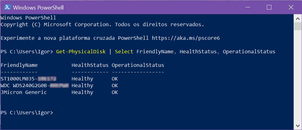 Janela do Windows PowerShell no Windows 10 com comando "Get-PhysicalDisk | Select FriendlyName, HealthStatus, OperationalStatus" executado.